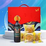 Wine bottle and mooncakes in front of a red gift box with a blue and white background
