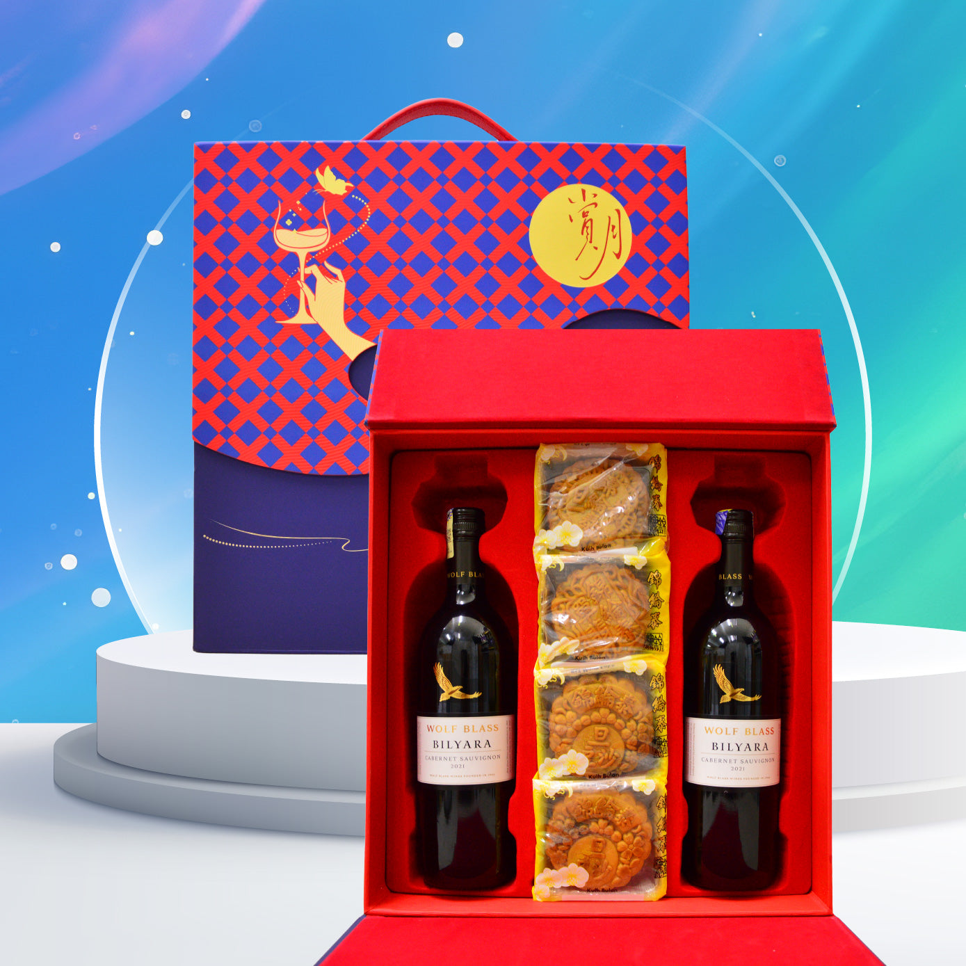 Wine and mooncake gift set with decorative box on a colorful background