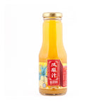 Bottle of pineapple juice with a red label on a white background