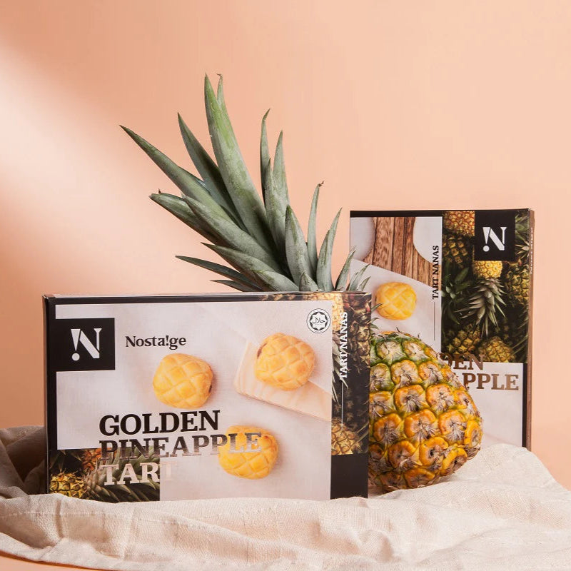Nostalgia Golden Pineapple treats with a pineapple on a peach background