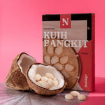 Kuih Bangkit packaging with a coconut and cookies on a pink background