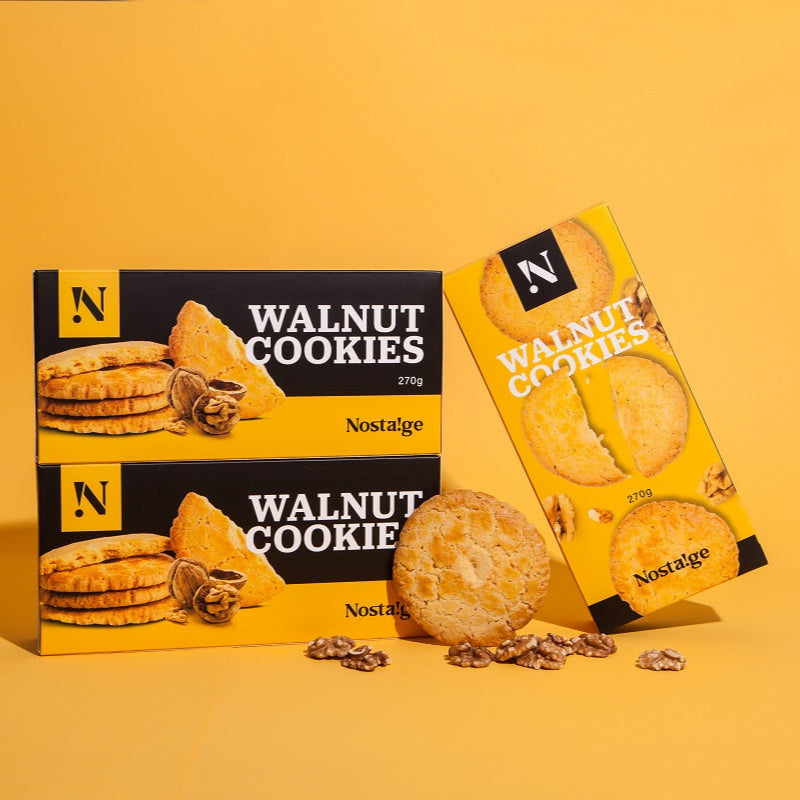 Nostalgia Walnut Cookies packaging on a yellow background